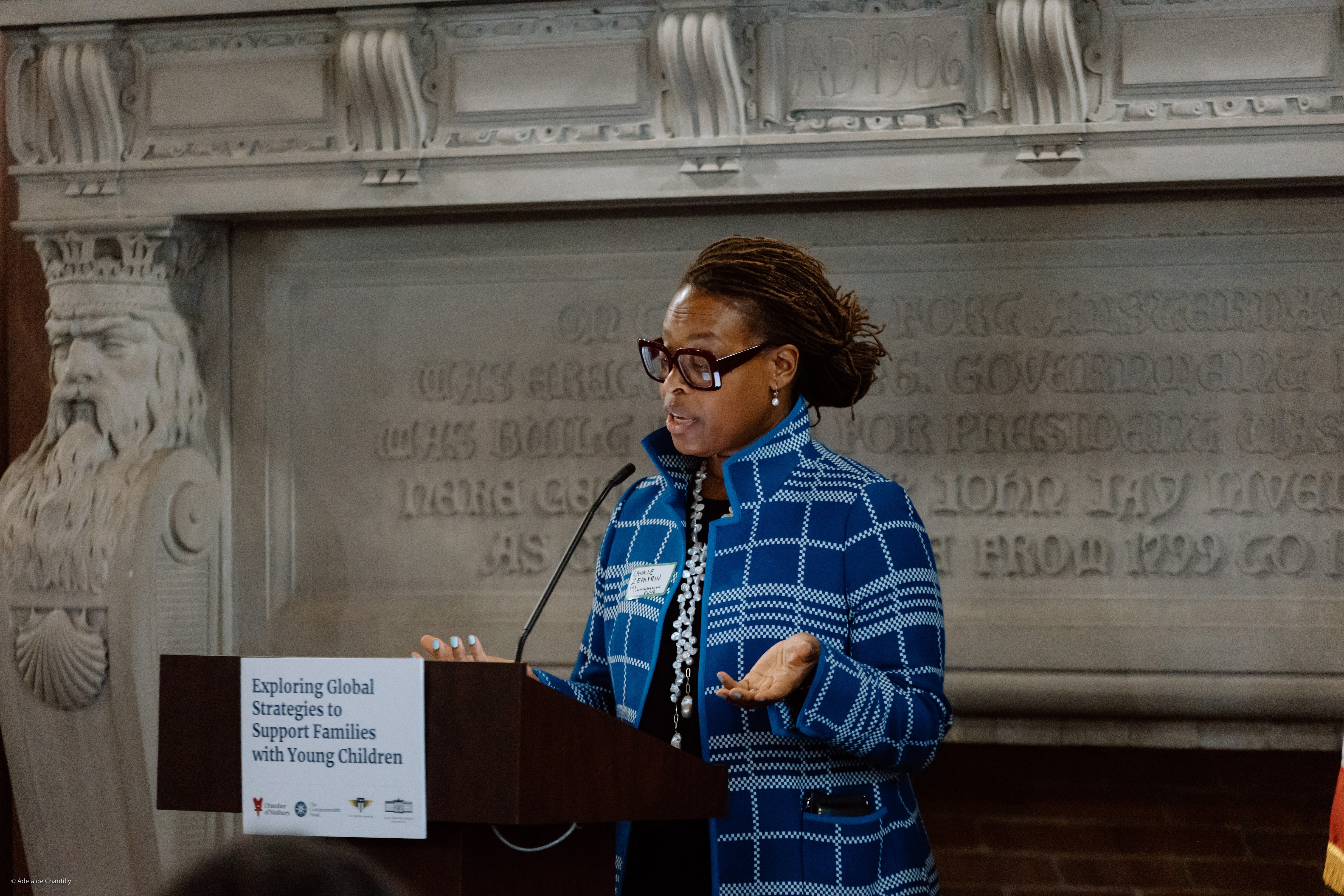 Dr. Laurie Zephyrin speaking at a podium.