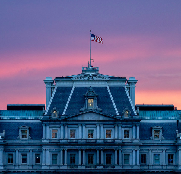 Sun sets behind the Eisenhower Executive Office Building